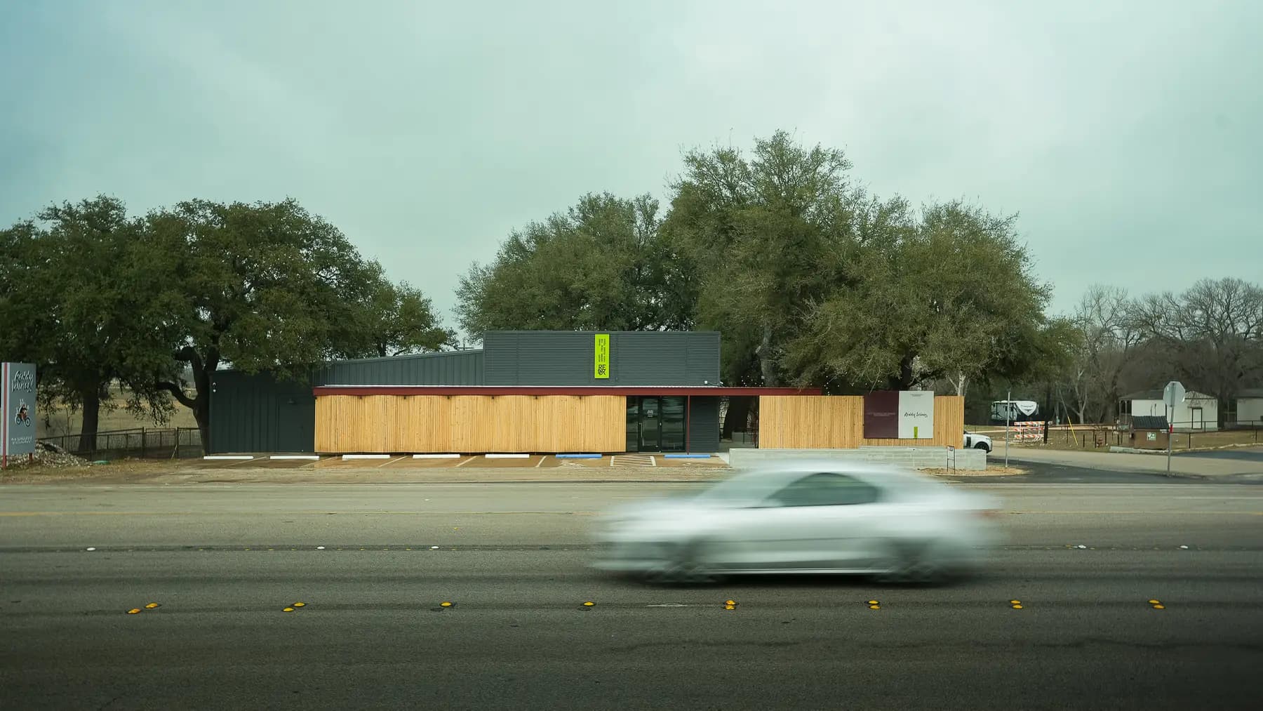 The Reddy Wines tasting room seen from US-290 in Stonewall, Texas